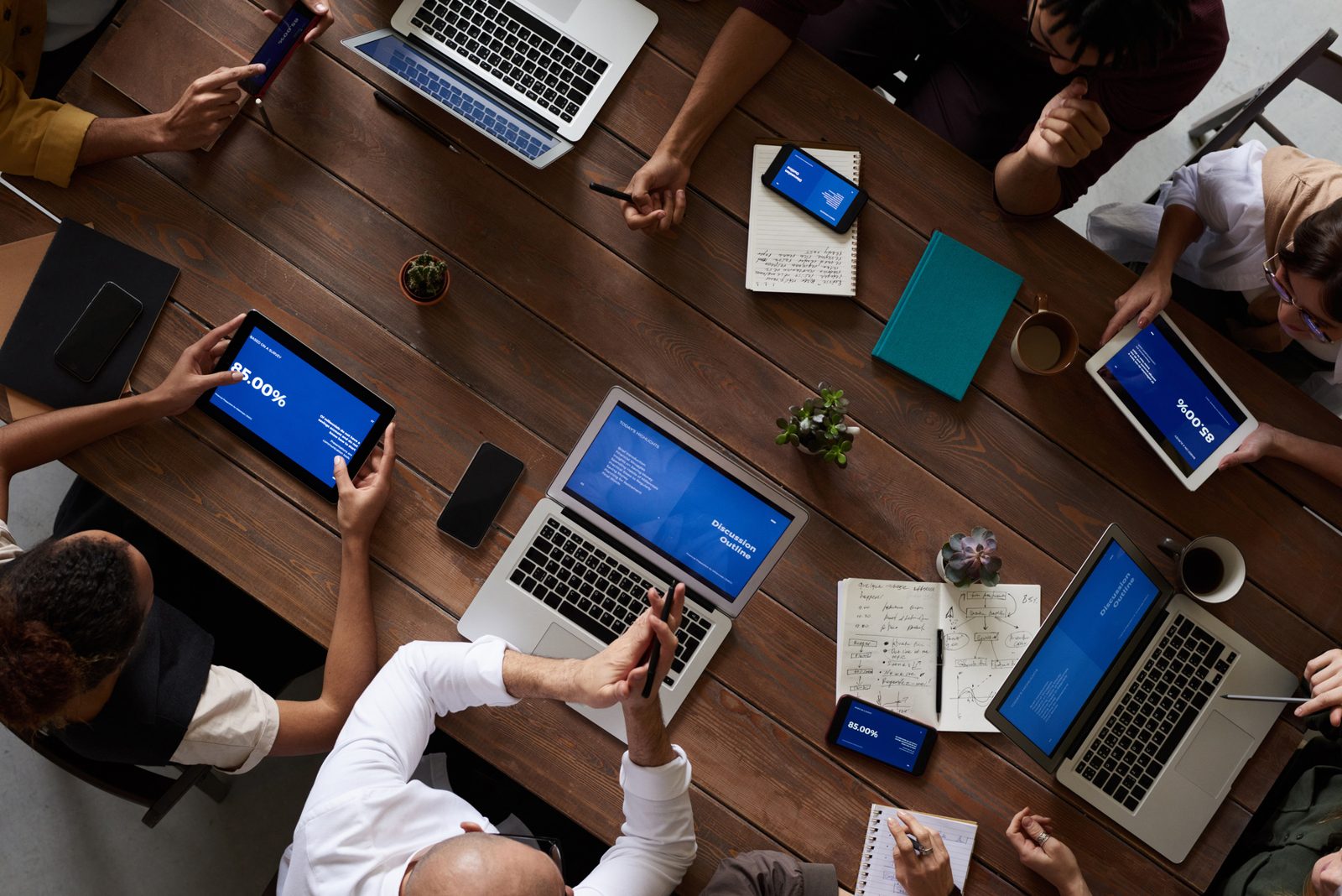 Documents and a laptop on a desk during a financing review